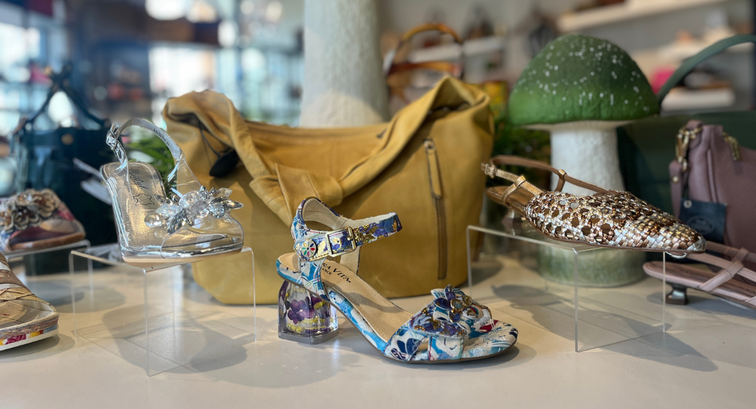 Women’s statement shoes on display with handbags at Waterlily Shoes in Sidney by the Sea.