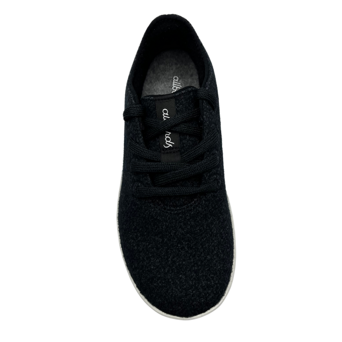 Top view of natural black merino wool sneaker with matching laces and white outsole