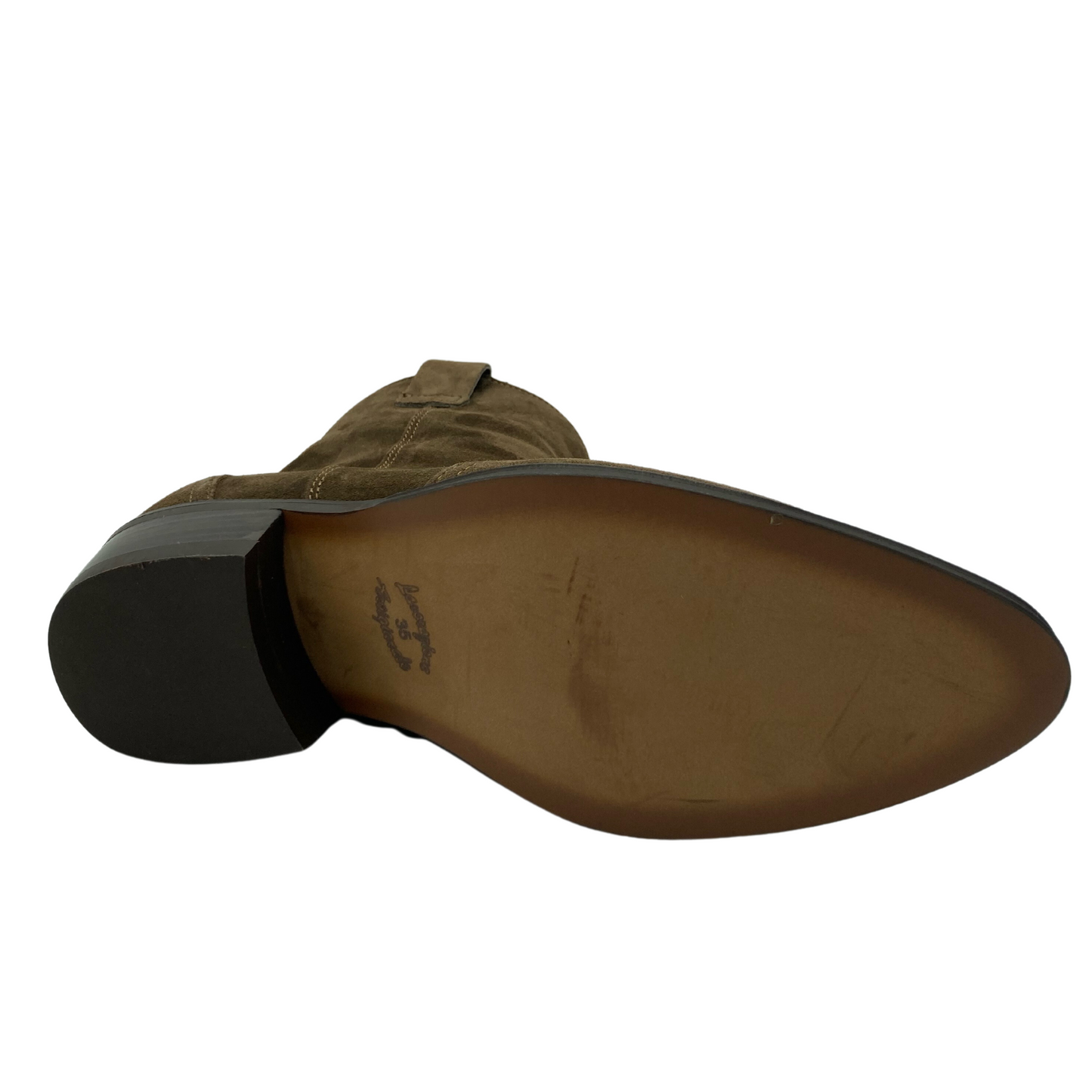 Bottom view of short suede cowboy boot with almond toe and stacked heel