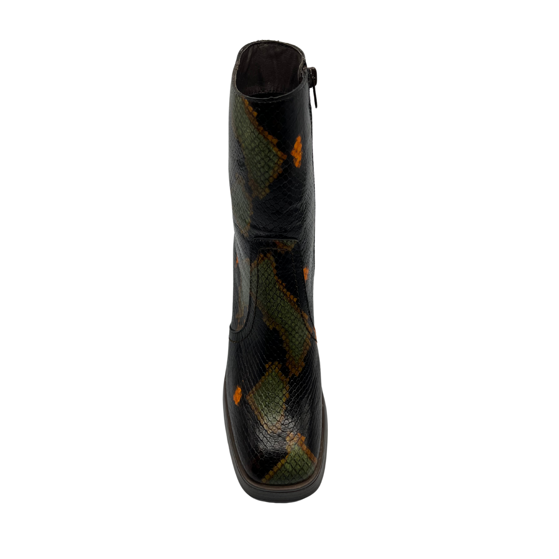 Top view of leather, snake print short boot. Chunky block heel, slightly squared toe and platform sole