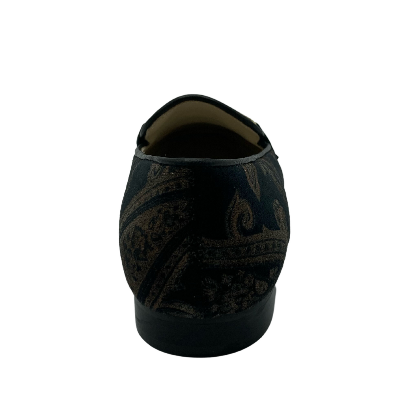 Heel view of brown and gold loafer with short black heel