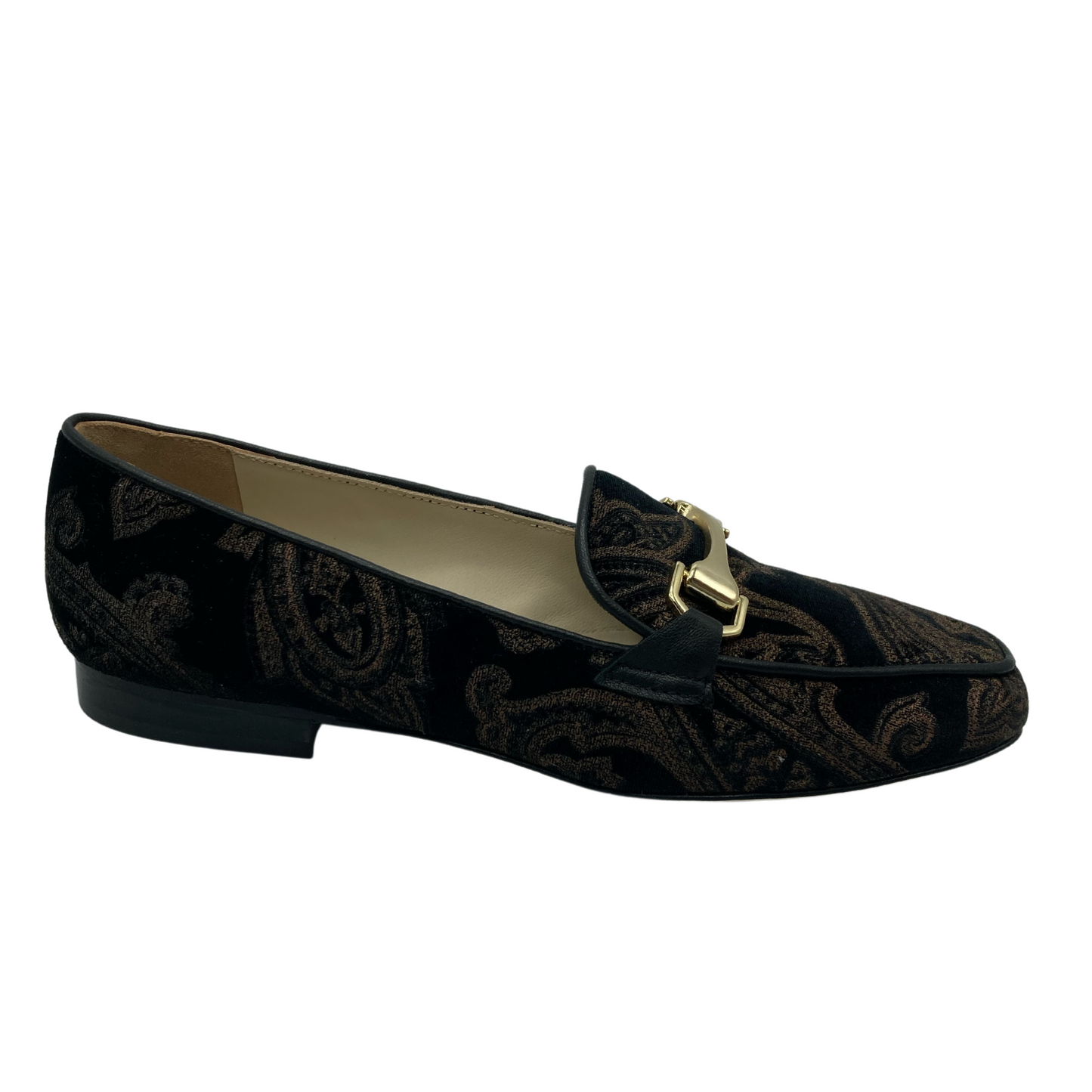 Right facing view of gold and brown loafer with low heel and gold bit detail on upper