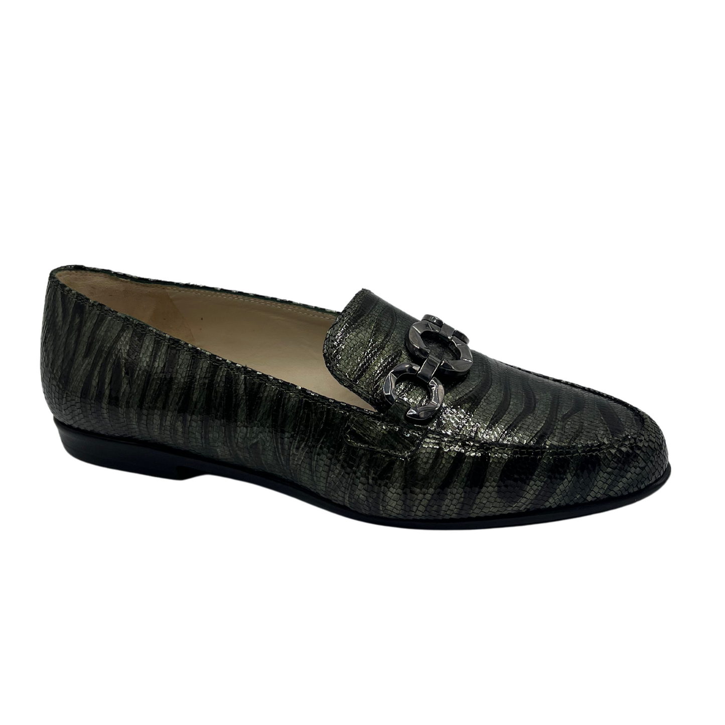 45 degree angled view of dark tiger print loafer with a shiny finish and metallic chain detail on upper.