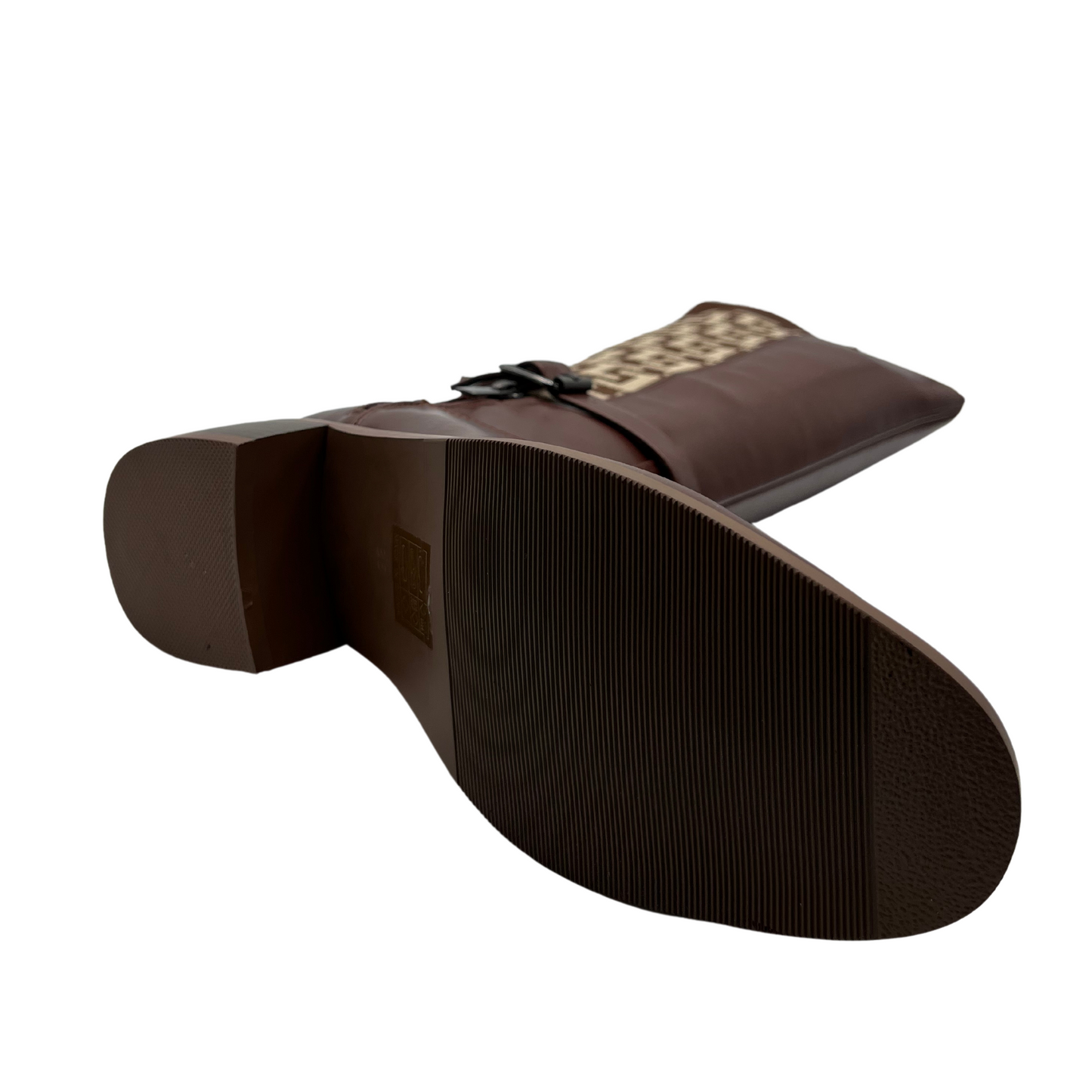 Bottom view of tan leather boots with short zipper closure, block heel and rounded toe