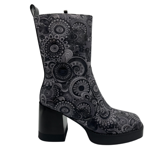 Right facing view of retro flower print boot with square toe and block heel