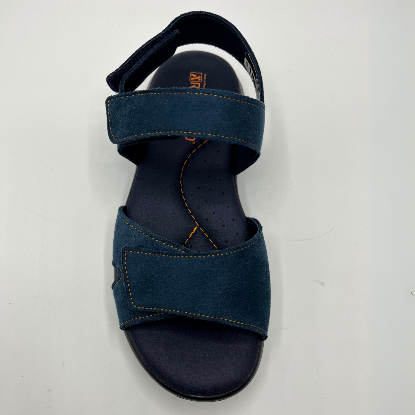 Top view of a blue multi-strap sandal with hook and loop closures and a black supportive outsole.
