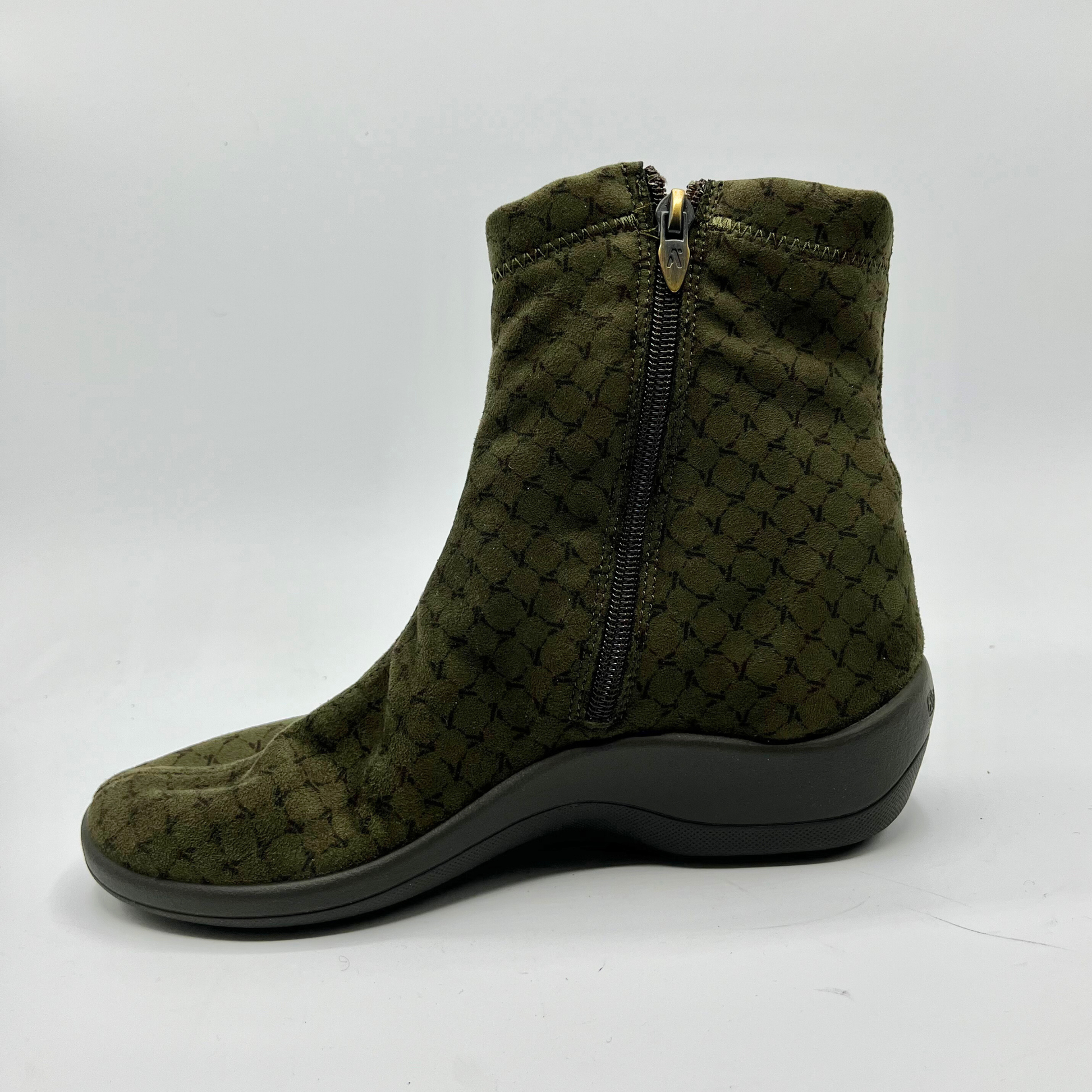 Green patterned ankle boot with a zipper on a white background