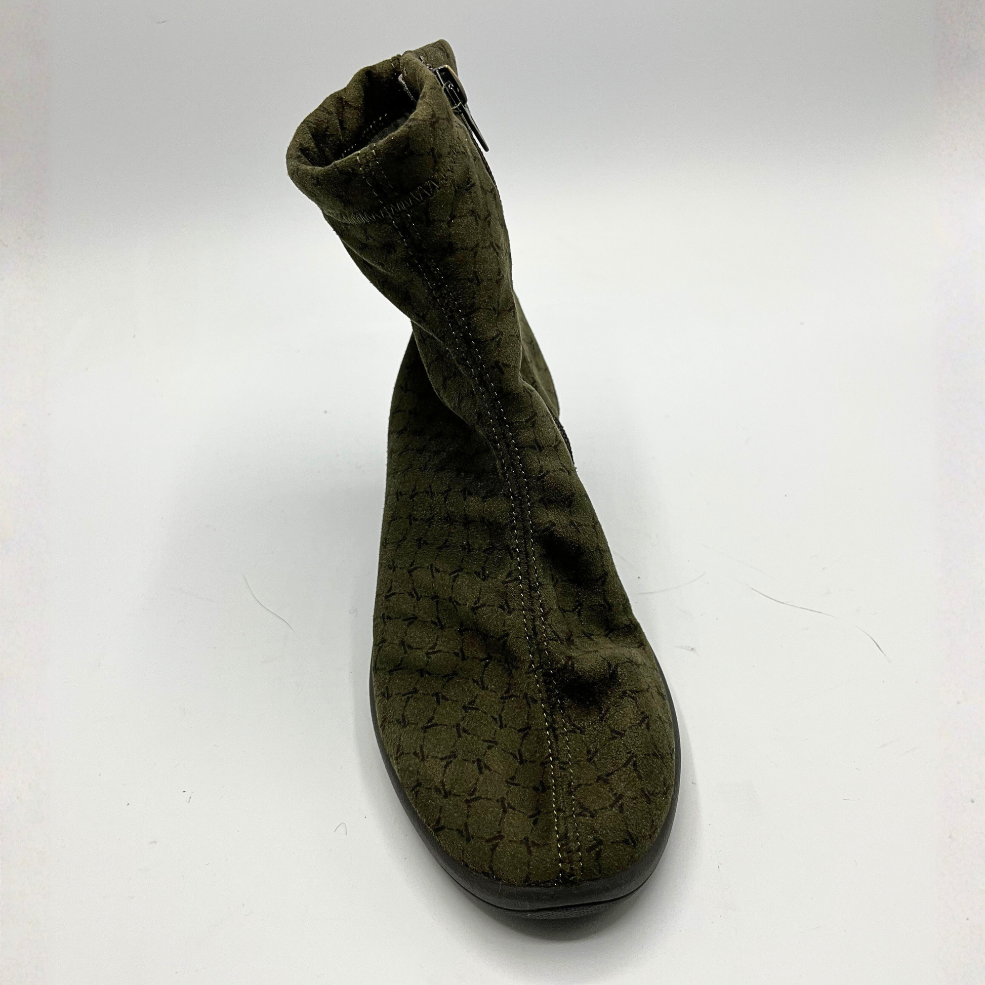 Green boot on a white background