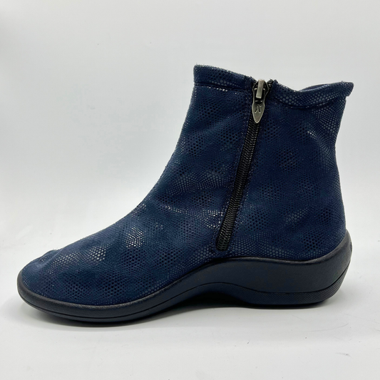 Blue ankle boot with a zipper on a white background