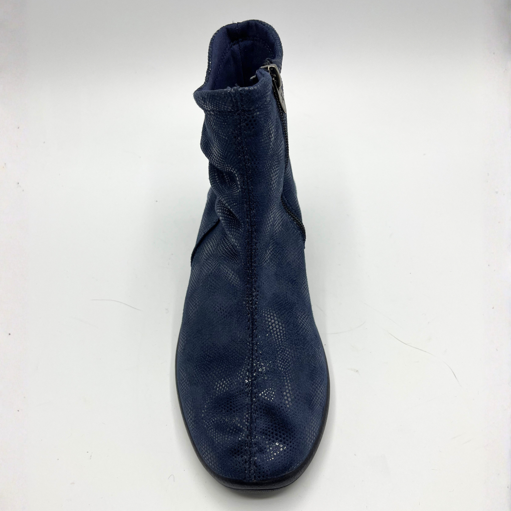 Navy blue ankle boot on a white background