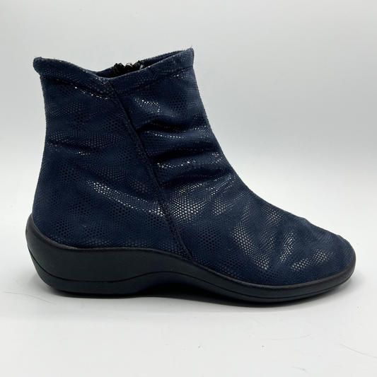 Navy blue ankle boot on a white background