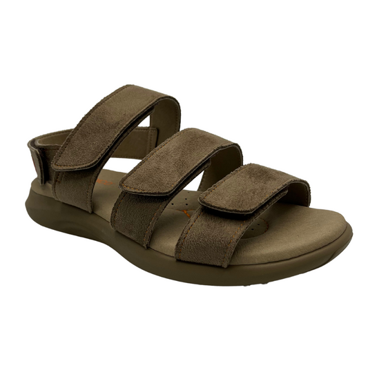 45 degree angled view of taupe leather sandals with 4 adjustable velcro straps. Cushioned footbed and open toe.