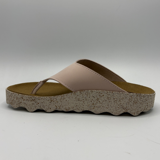 Single sandal with a pink strap and textured sole on a white background