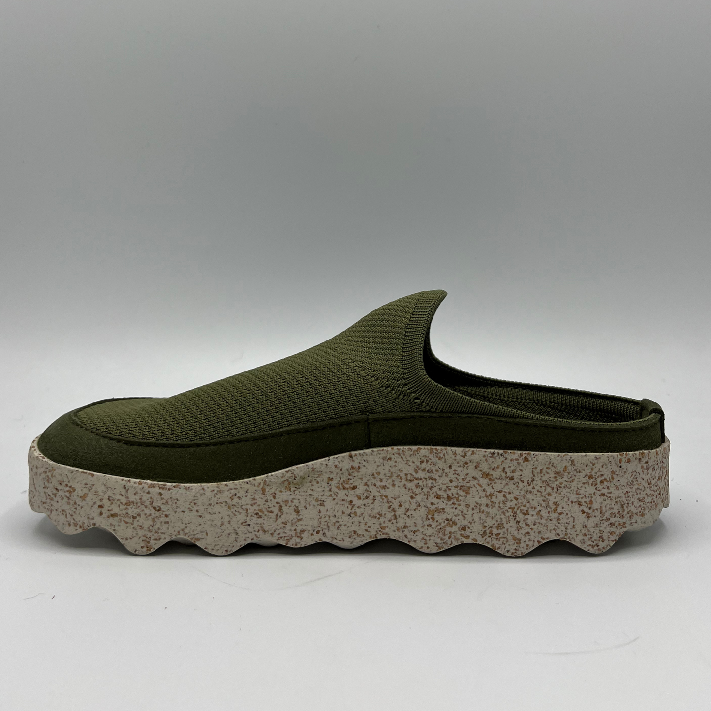 Left facing view of a green textile slip on clog with a contoured footbed and lightweight outsole.