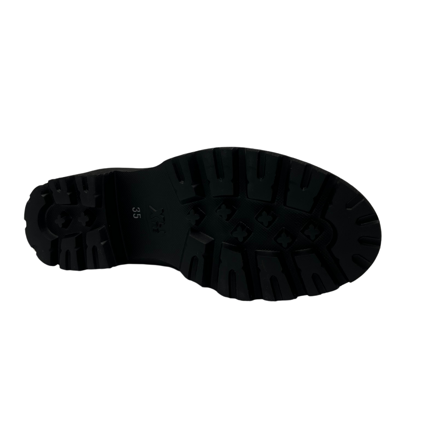 Bottom view of black leather loafer with thick black outsole and leather lining