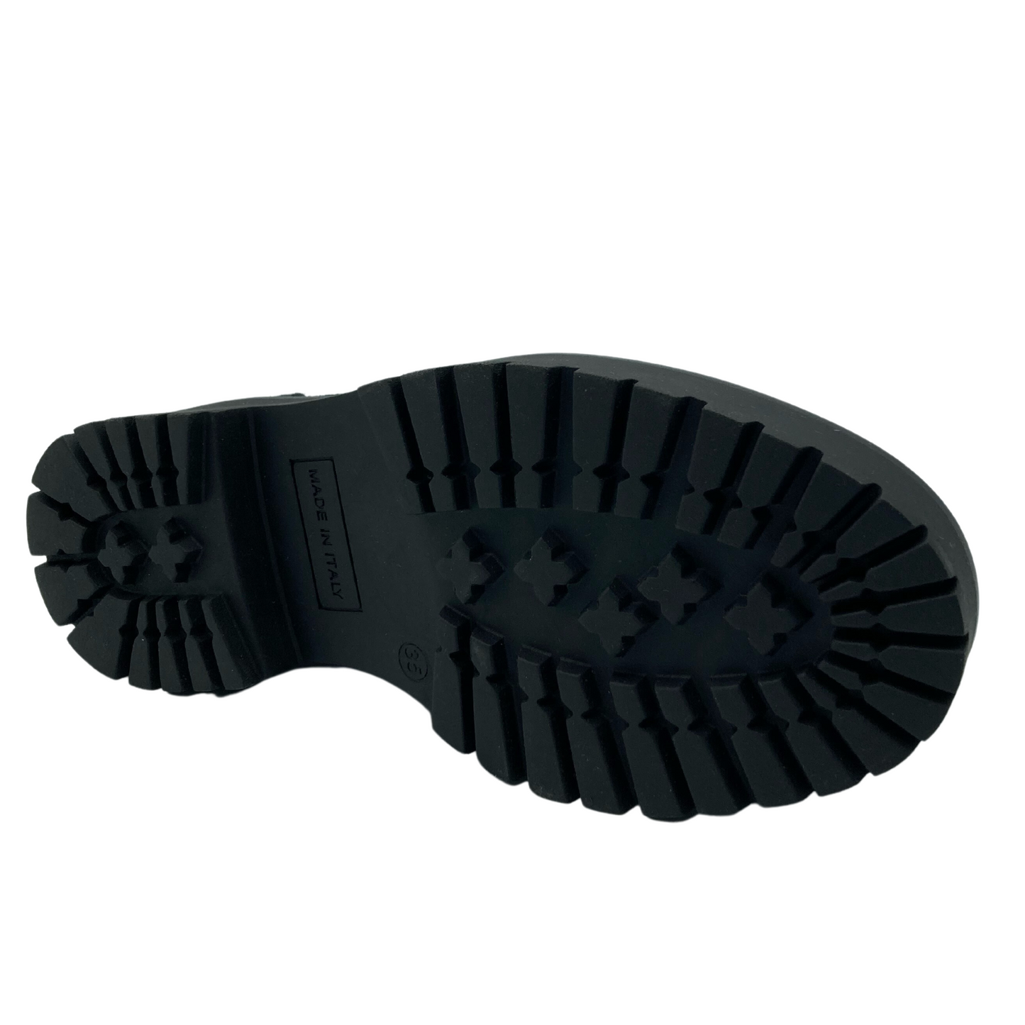 Bottom view of navy suede loafer with black lug sole