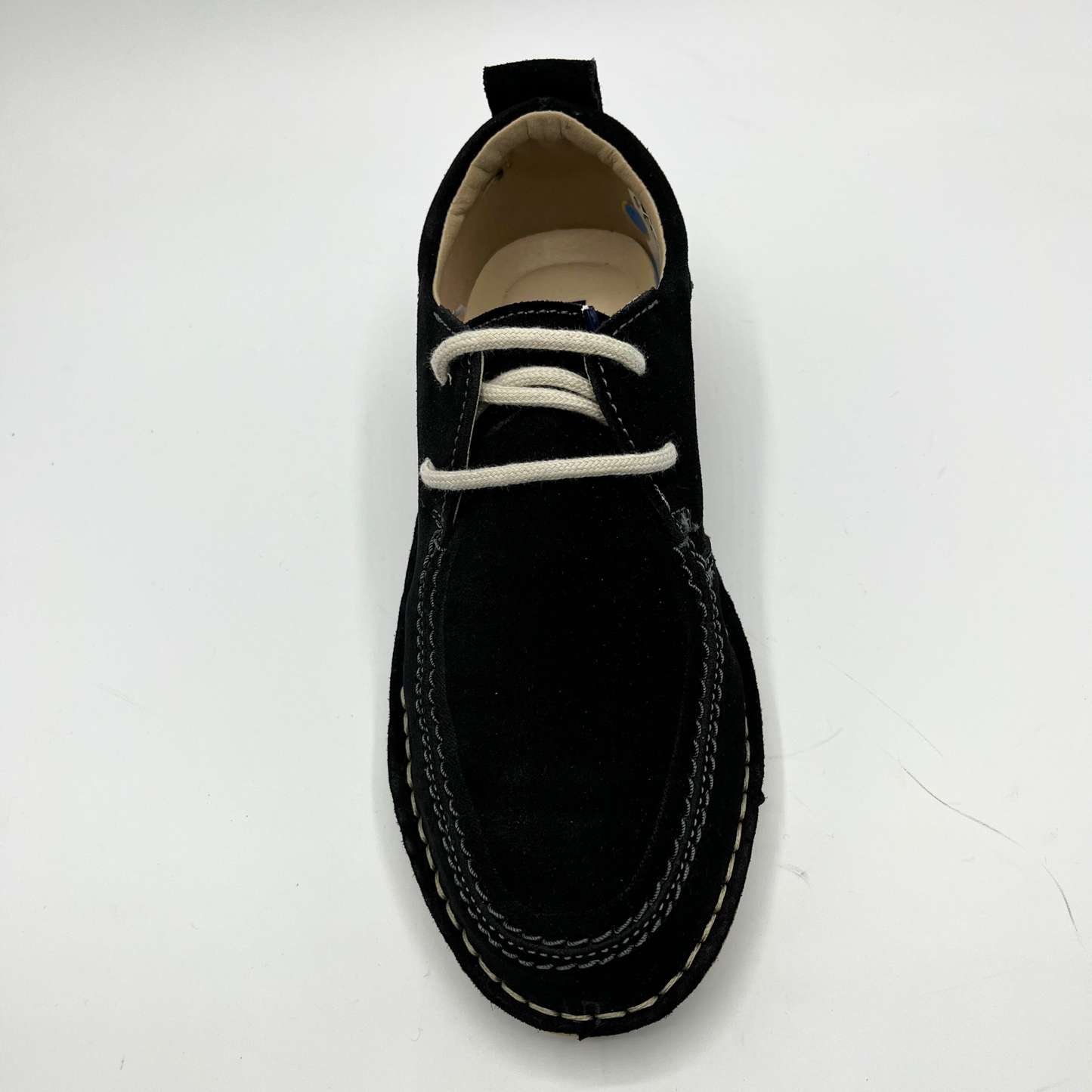 Black shoe with white laces on a white background