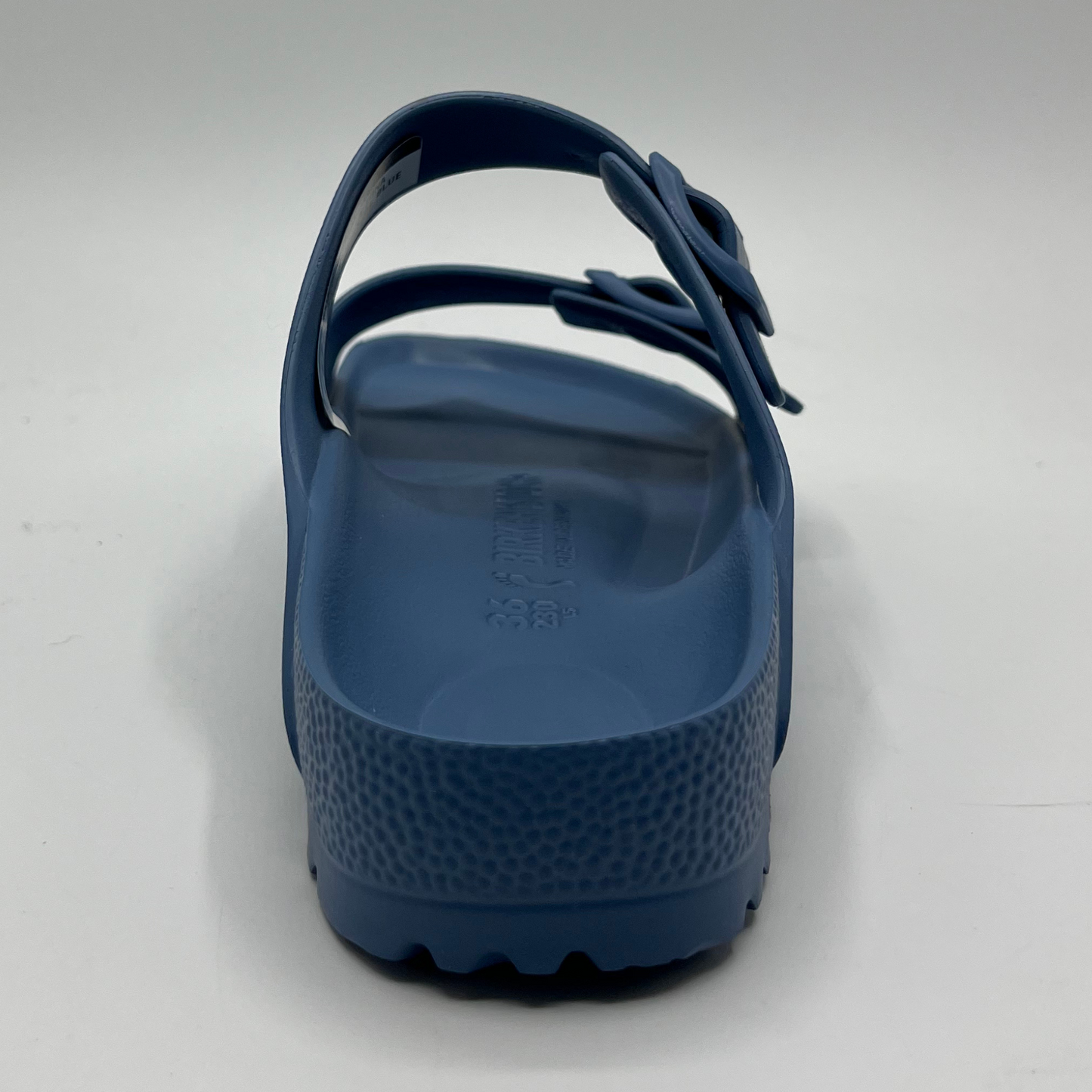 Back view of a lightweight EVA sandal in a blue colour with two adjustable straps.