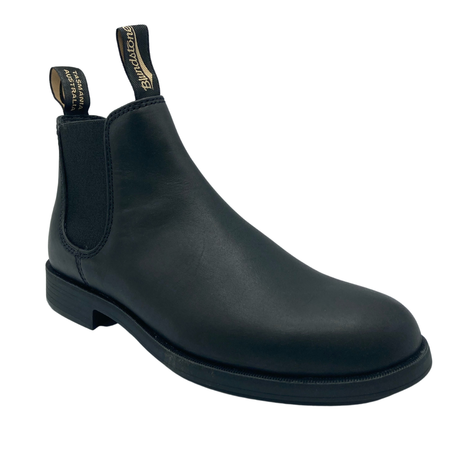45 degree angled view of black leather dress boot with side elastic gore and double pull on tabs on upper