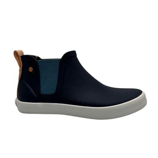 Right facing view of waterproof navy ankle boot with elasticated side gores and white outsole