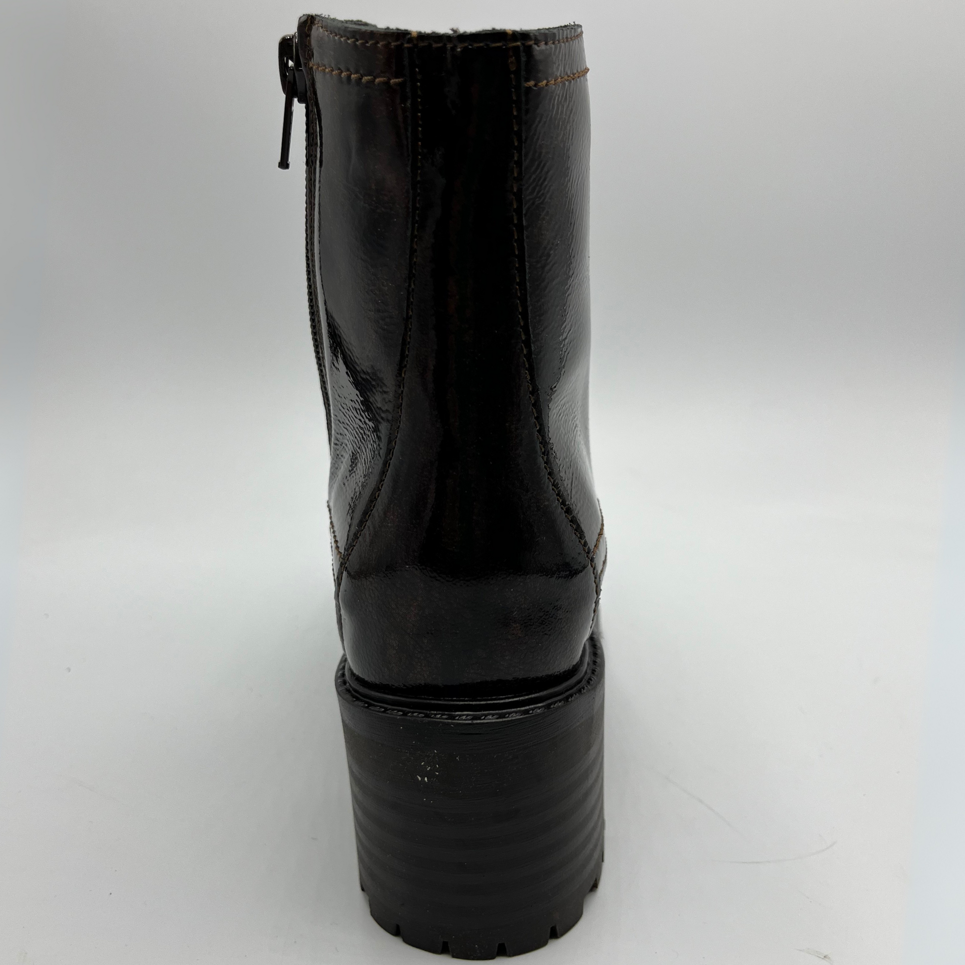 Chocolate leather  boot on a white background