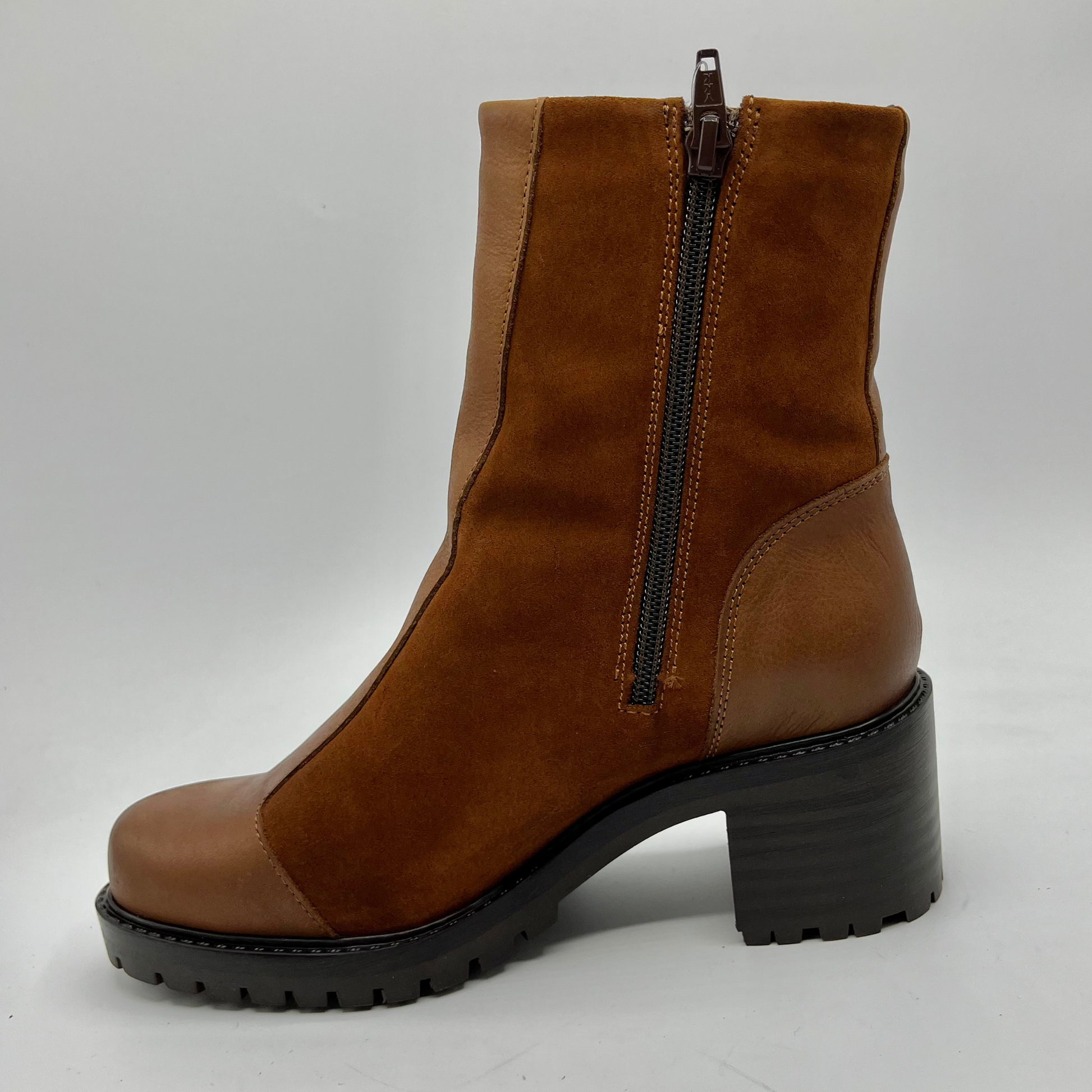 Red brown ankle boot with a zipper on a white background