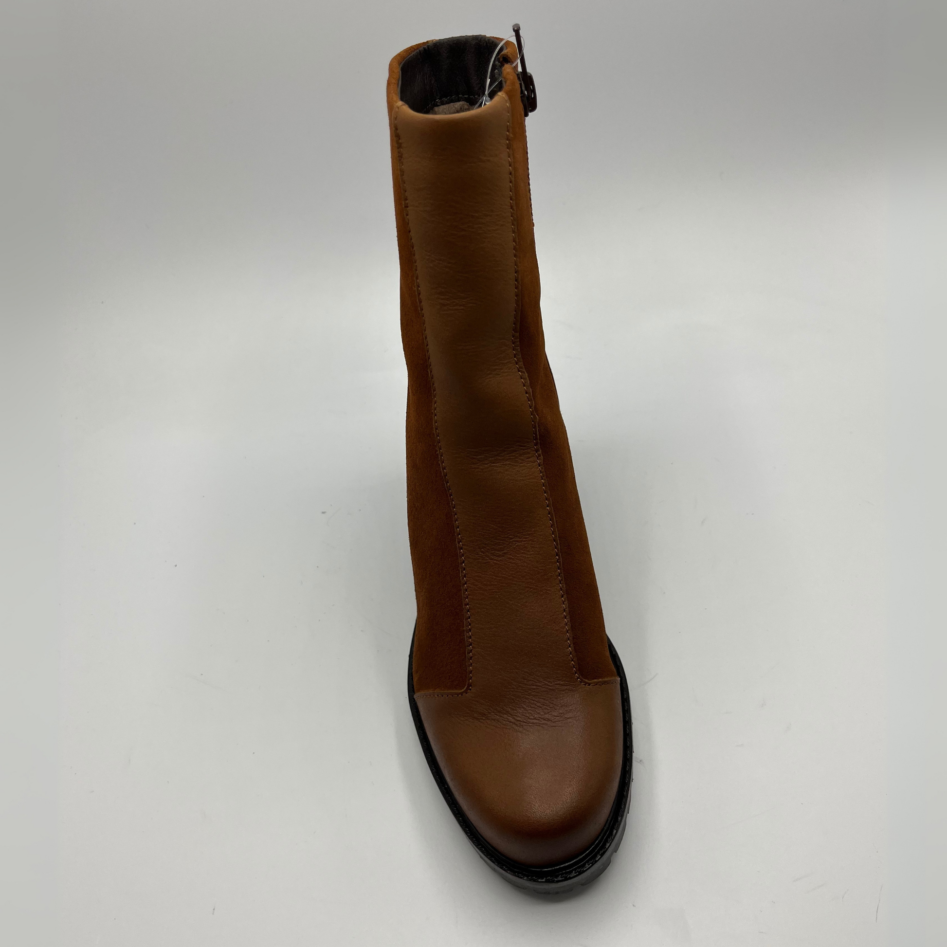 Brown boot on a white background