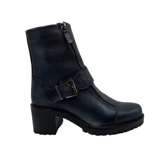 Right facing view of dark blue leather boot with chunky heel, mid height strap and off center zipper closure and side zipper closure