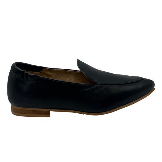 Right facing view of navy leather loafer with pointed toe and short block heel, leather lining and elasticated back.