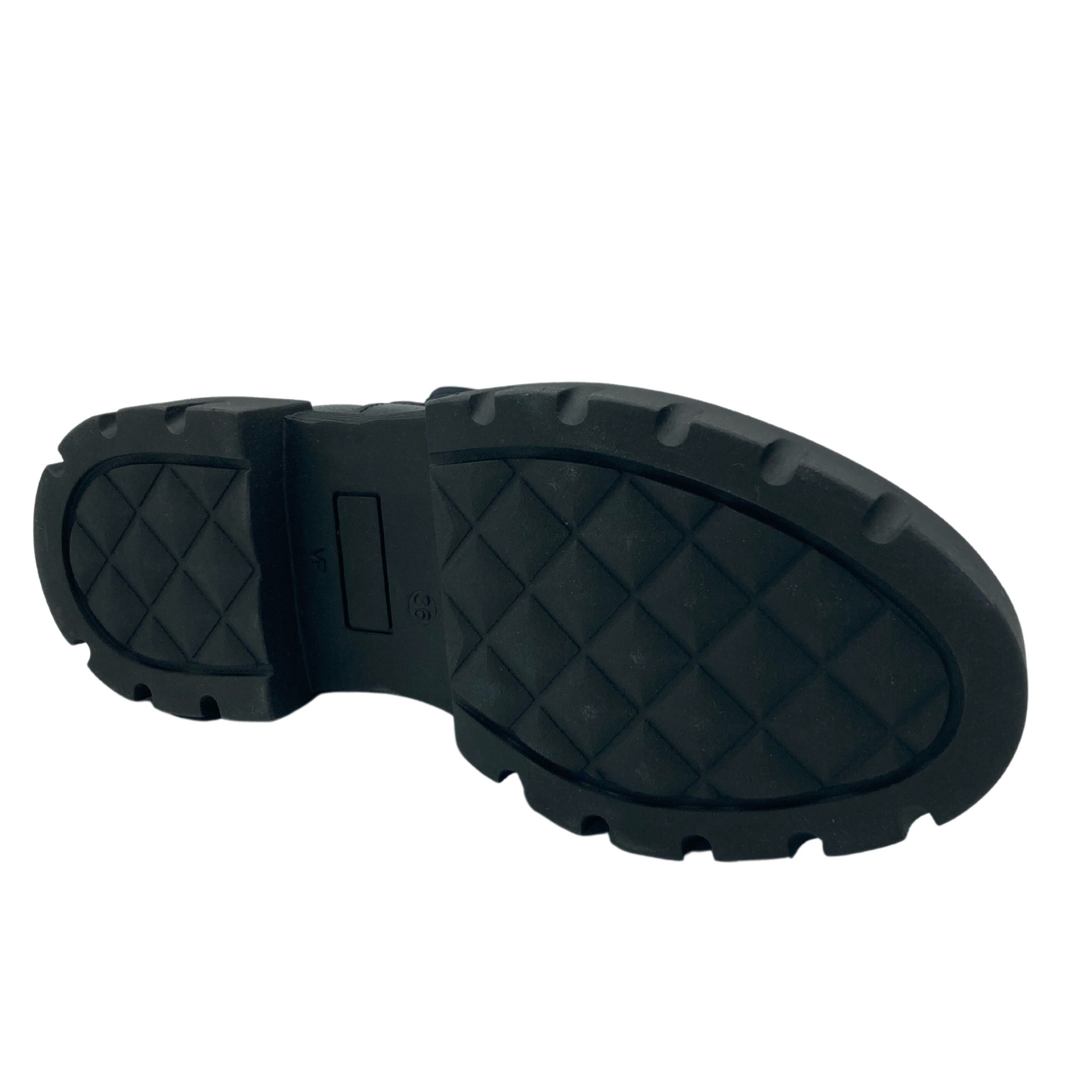 Bottom view of short boot with black rubber sole