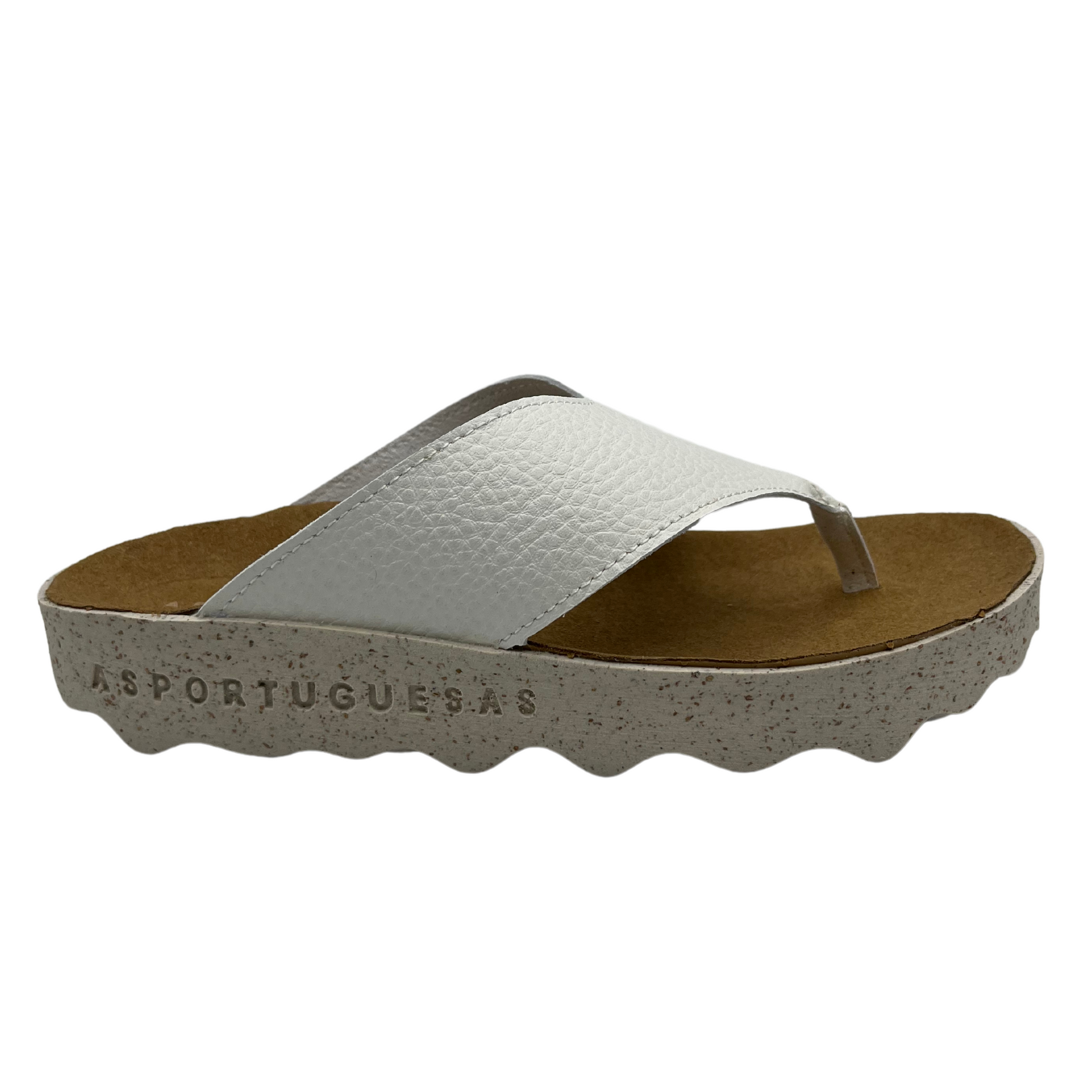 Right facing view of white strapped thong sandal with brown contoured footbed and white speckled outsole
