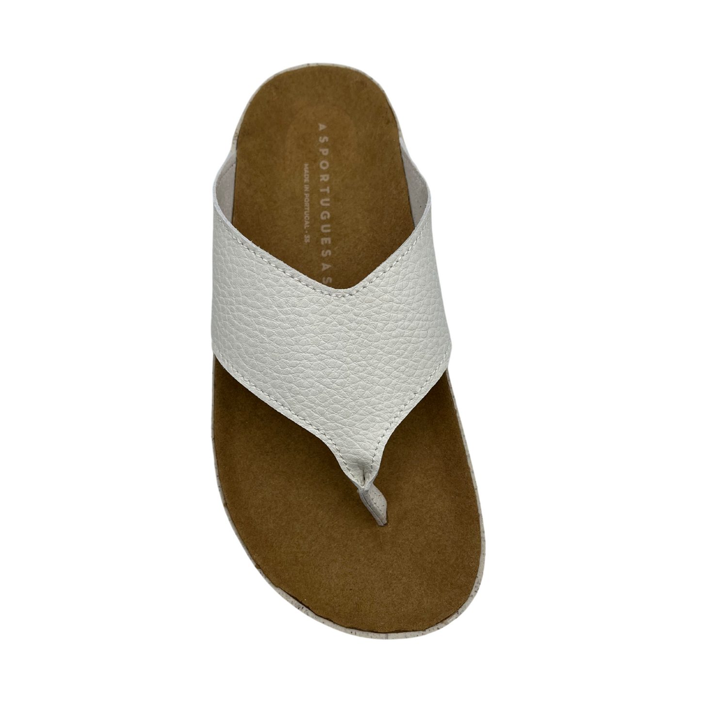 Top view of white strapped thong sandal with brown contoured footbed and white speckled outsole