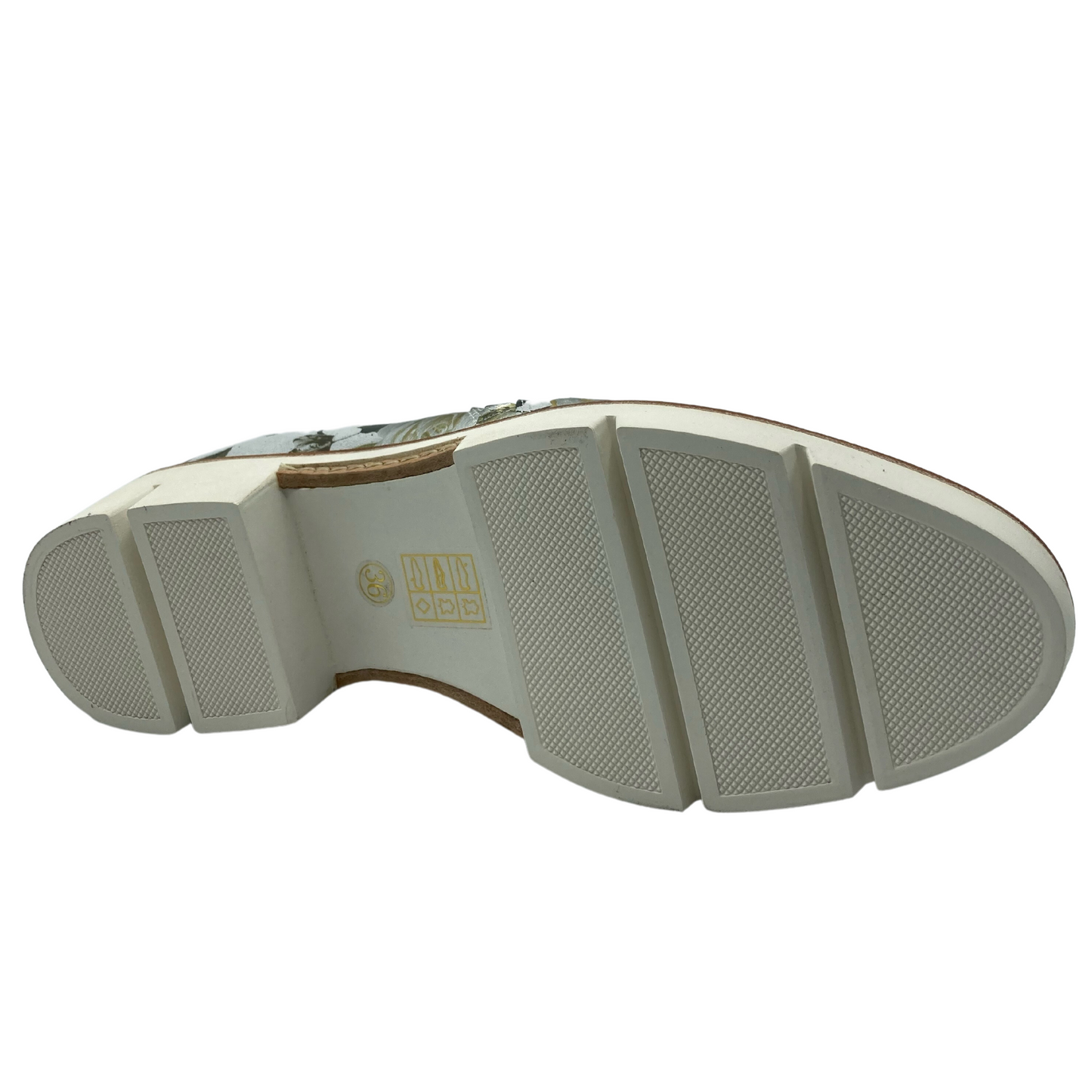Bottom view of foil printed suede shoe with white synthetic outsole