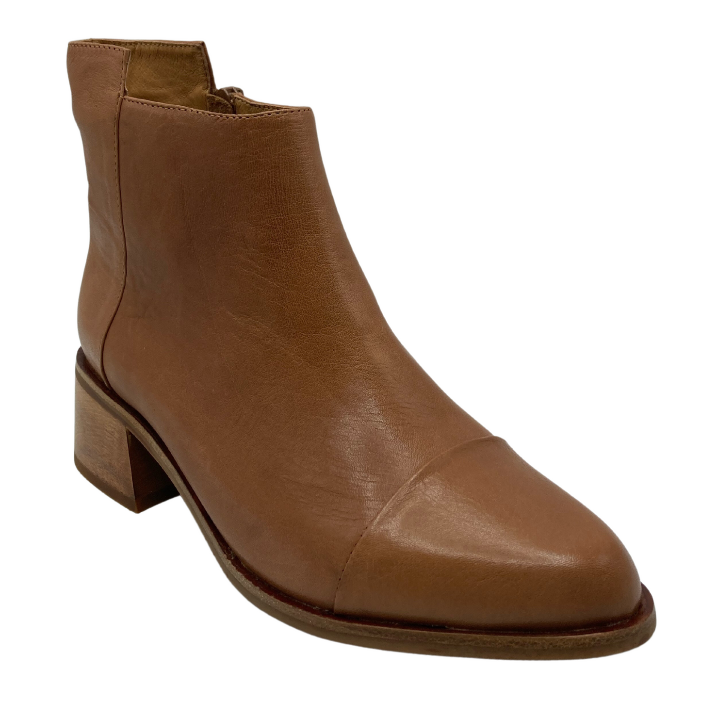 45 degree angled view of leather ankle boot with pointed toe and block heel
