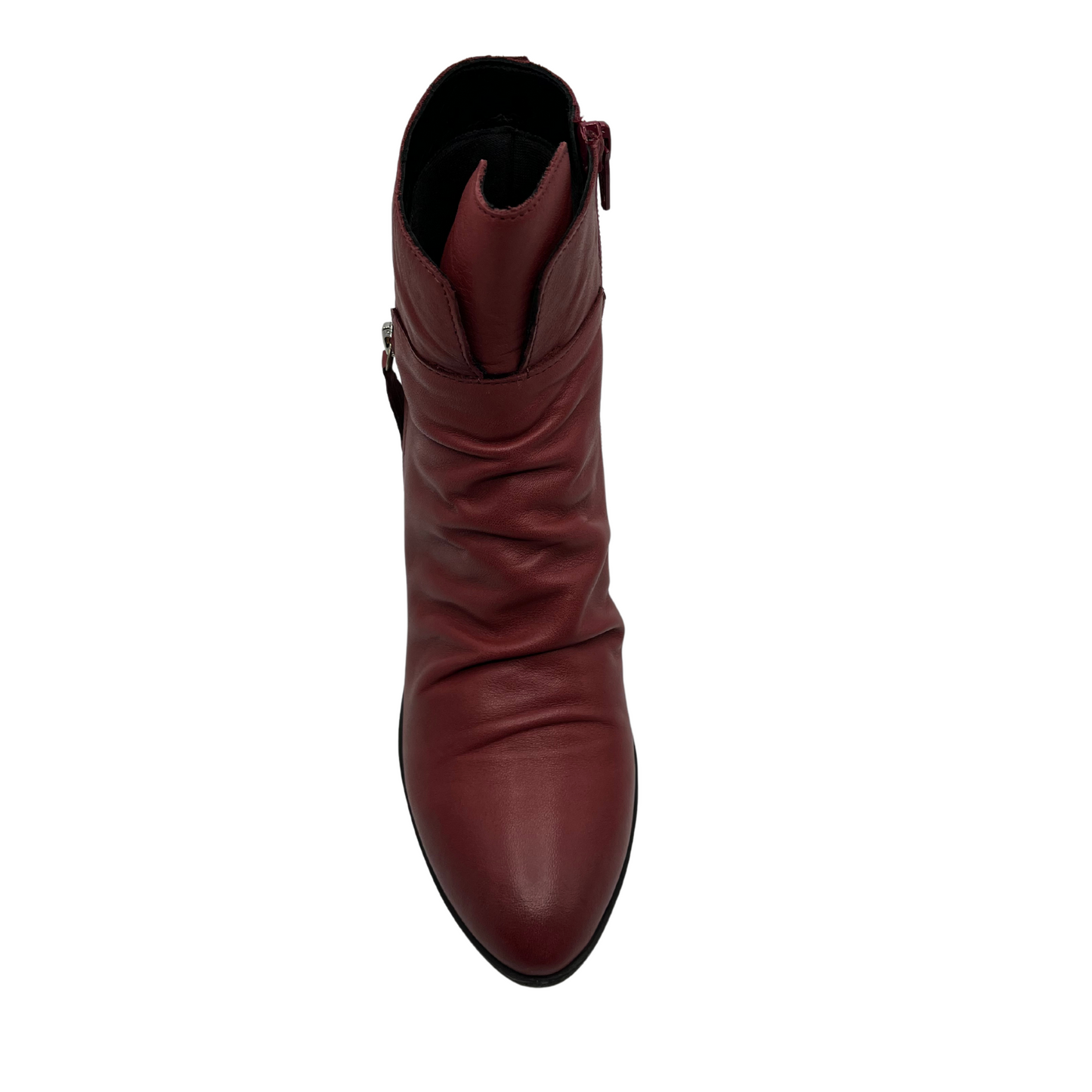 Top view of red leather short boot with a slouchy rouched upper, side zipper closure, 2 inch chunky heel and pointed toe