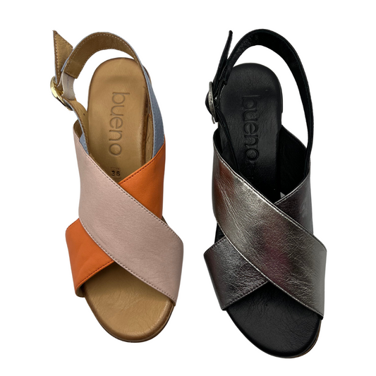 Top view of two leather sandals side by side. One is pink and orange and the other is black and silver. Both have a slingback strap and rounded toe