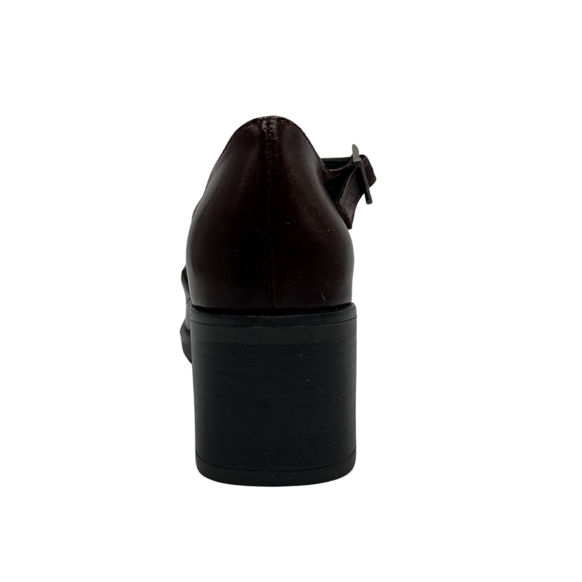 Back view of burgundy patent leather shoe with ankle strap, thick block heel and rounded toe.