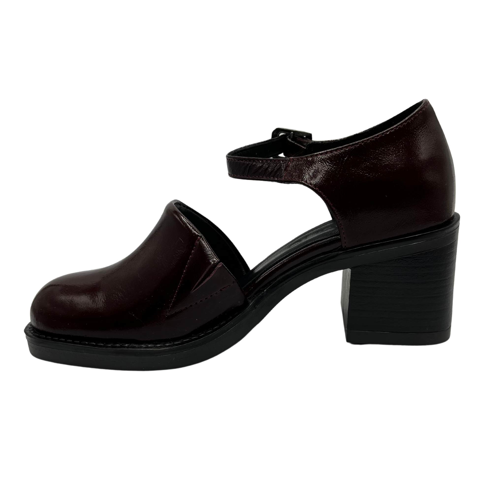 Left facing view of burgundy patent leather shoe with ankle strap, thick block heel and rounded toe.