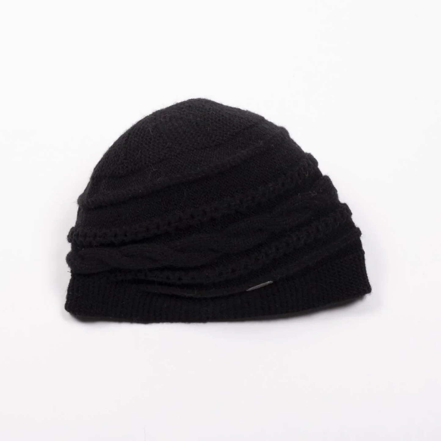 Front view of a round cable knit beanie in a black colour