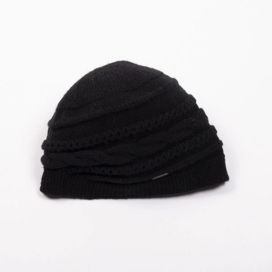 Front view of a round cable knit beanie in a black colour