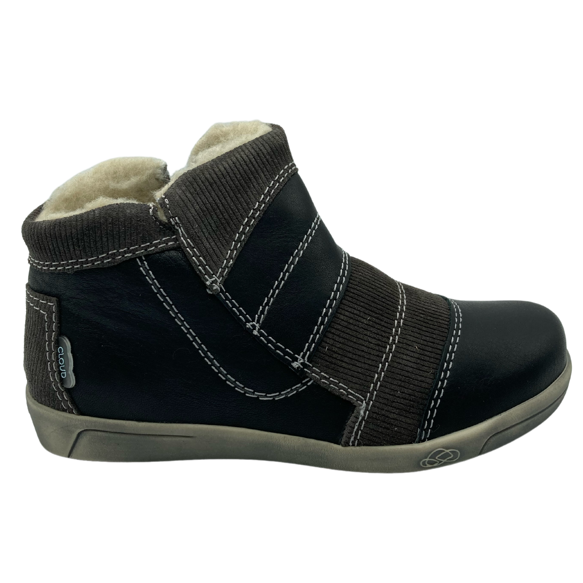 Right facing view of leather patchwork ankle boot with wool lining and rubber outsole