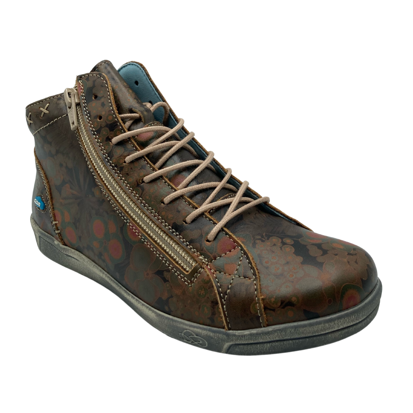 45 degree angled view of brown and red leather sneaker with brown laces and side zipper closure