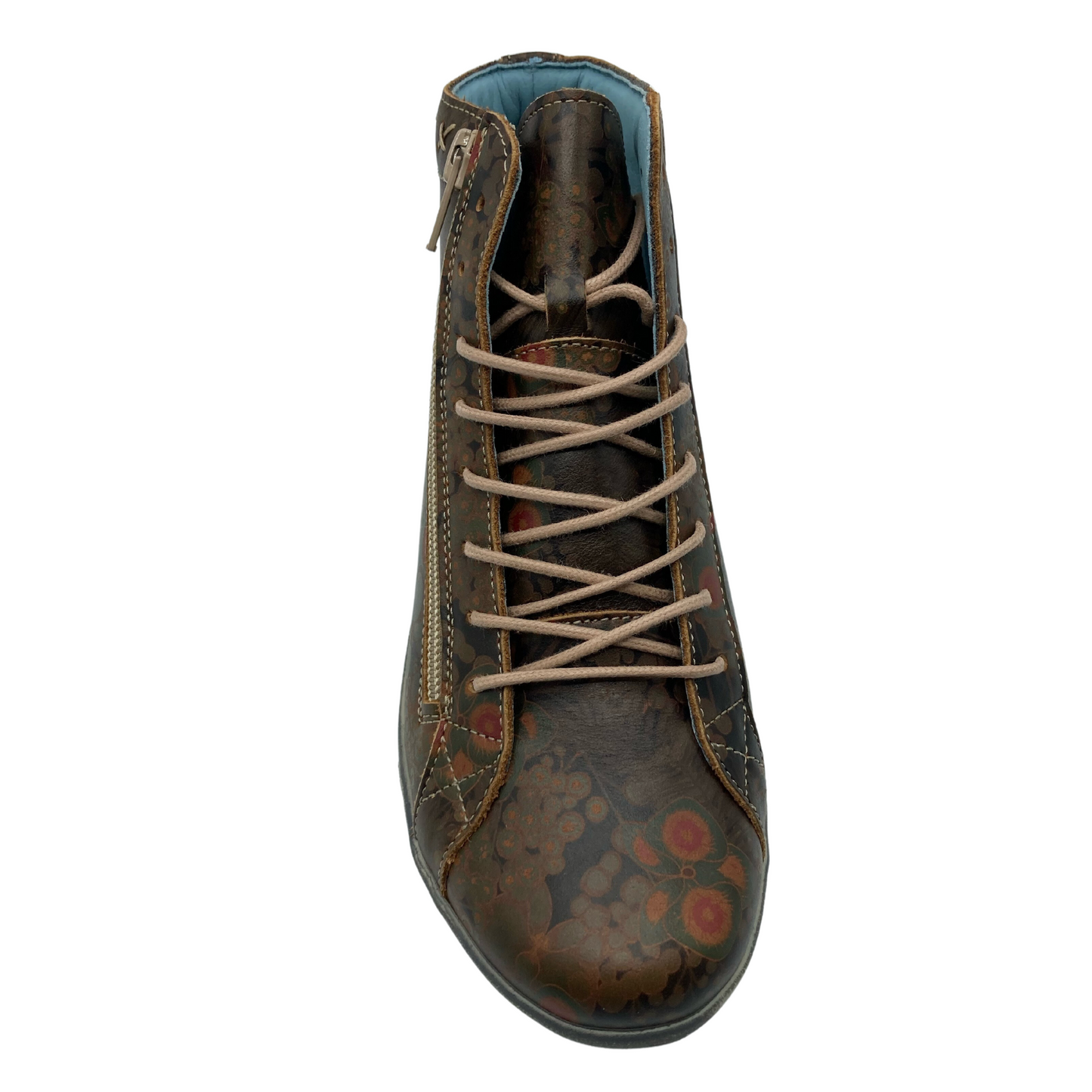 Top view of leather sneaker with brown laces and blue inner lining