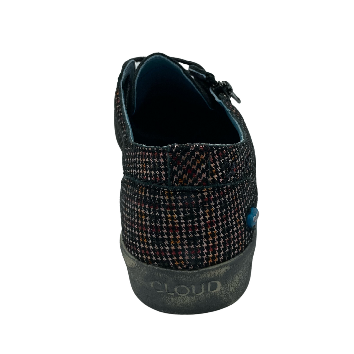Back view of leather sneaker with grey rubber outsole and black laces