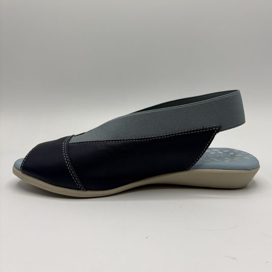 Navy sandal with a slingback design on a white background