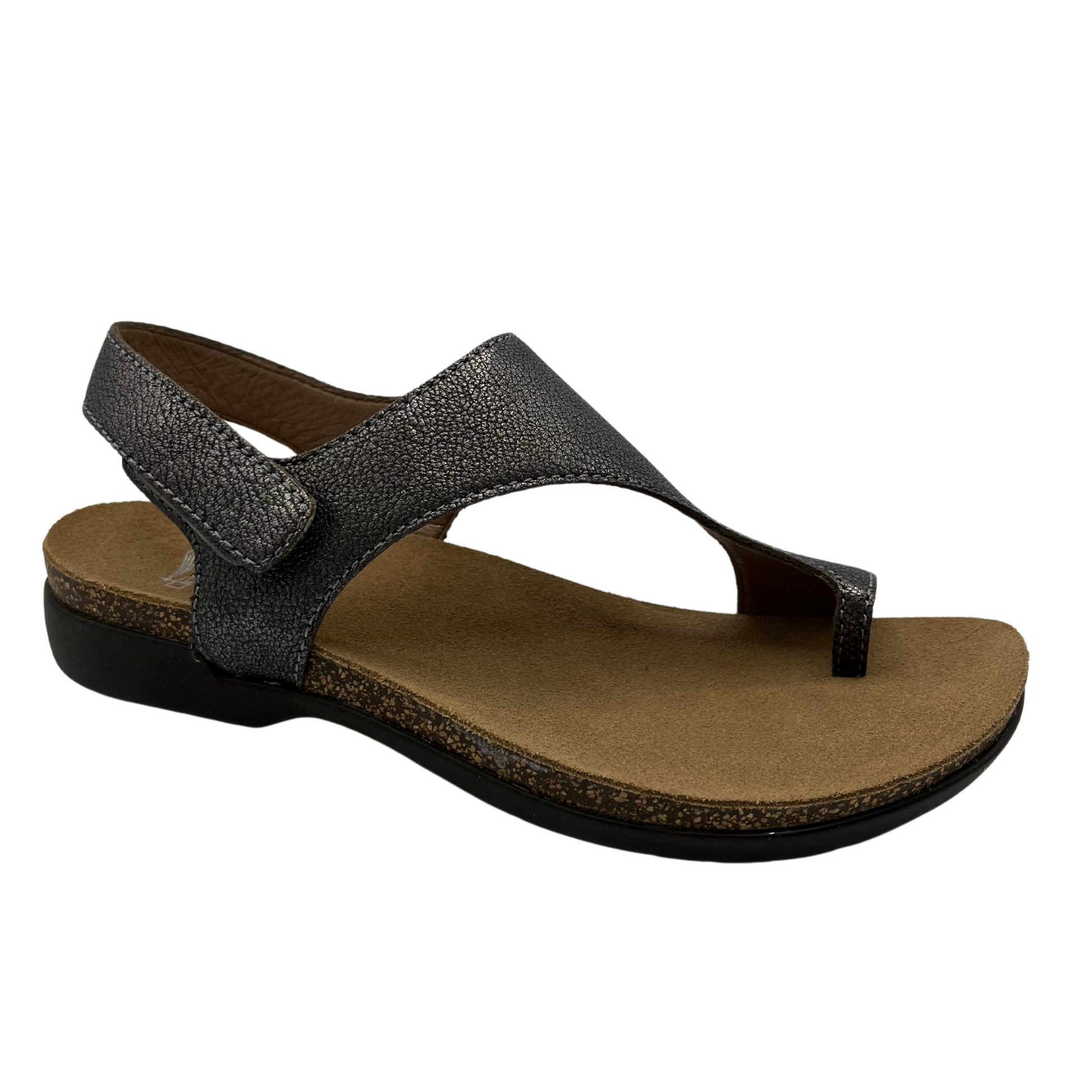 45 degree angled view of metallic pewter sandal with velcro ankle strap and thin toe strap