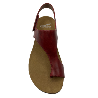 Top view of dark red leather sandal with velcro ankle strap and thin toe strap