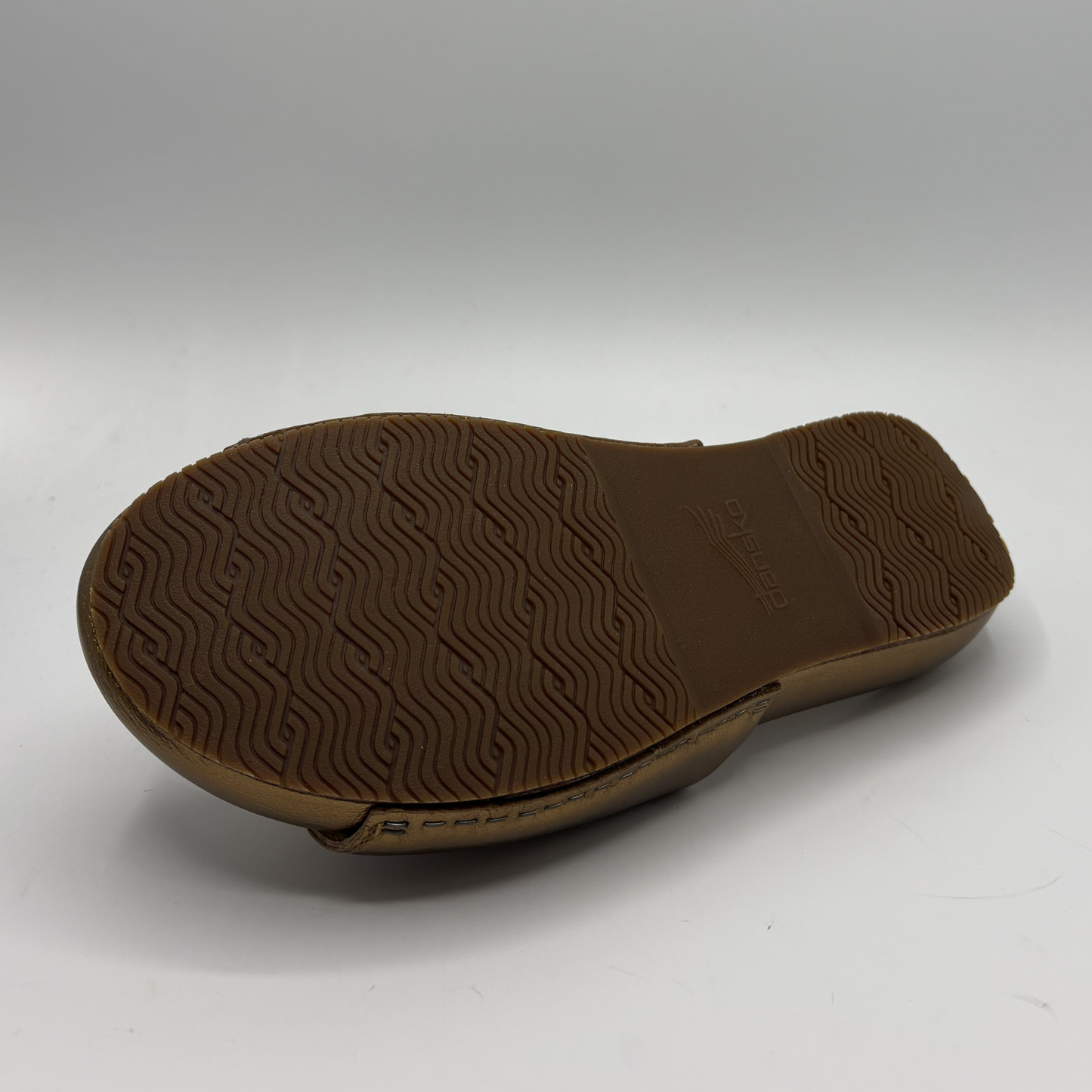 Brown shoe sole on a white background