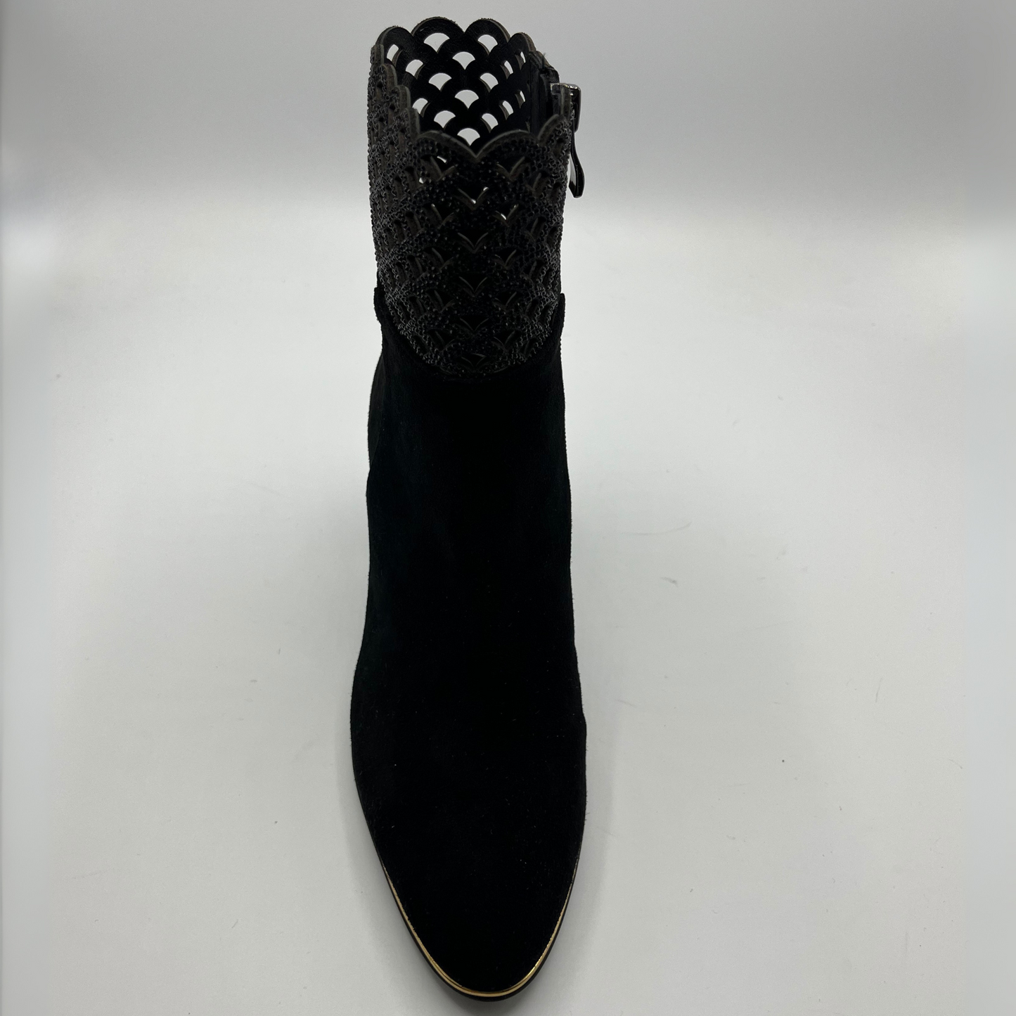 Top view of a black high heeled boot with shimmer detail
