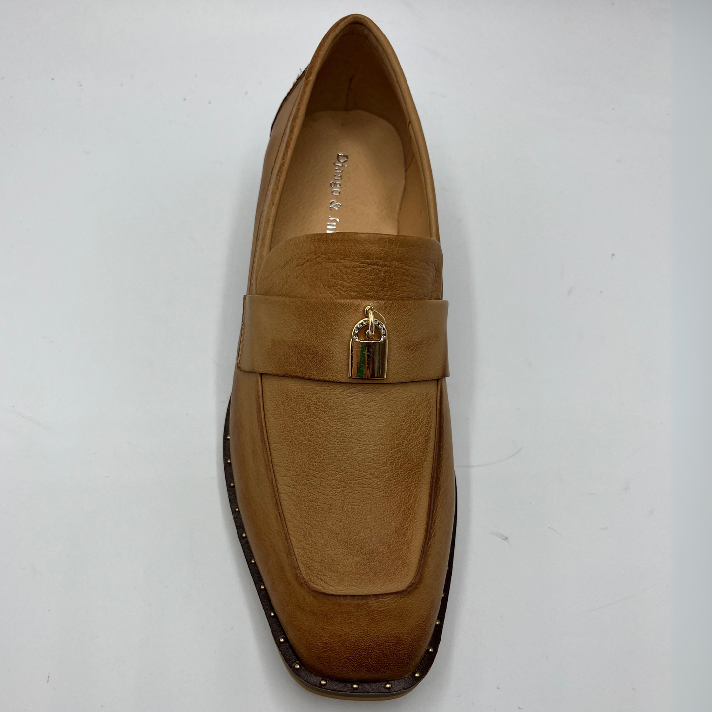Top view of a tan leather loafer